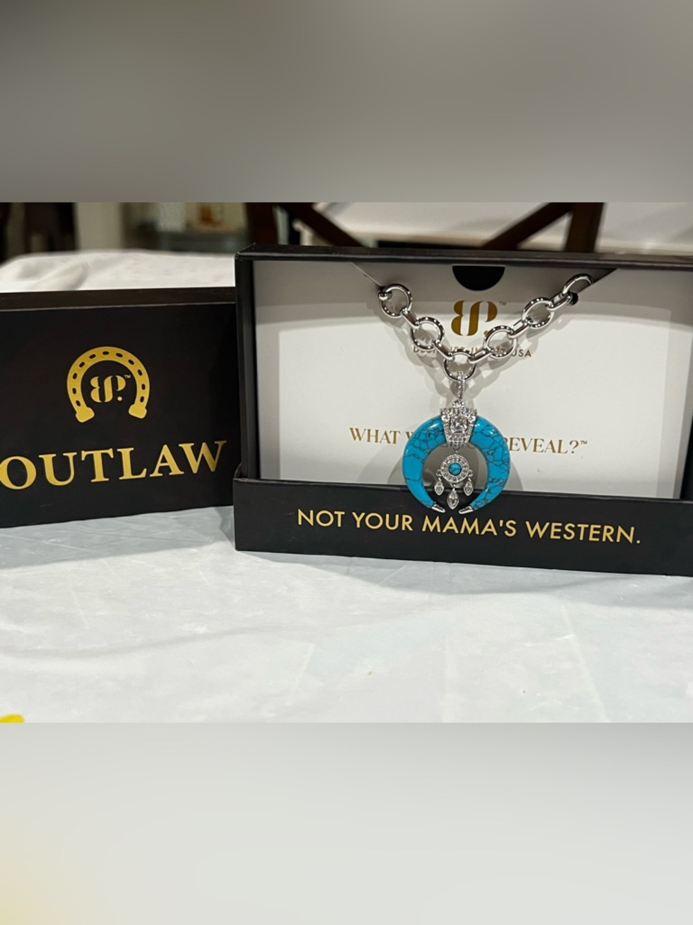 Bomb party outlaw built with a back bone necklace